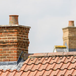 Brick chimney stack on modern contemporary house